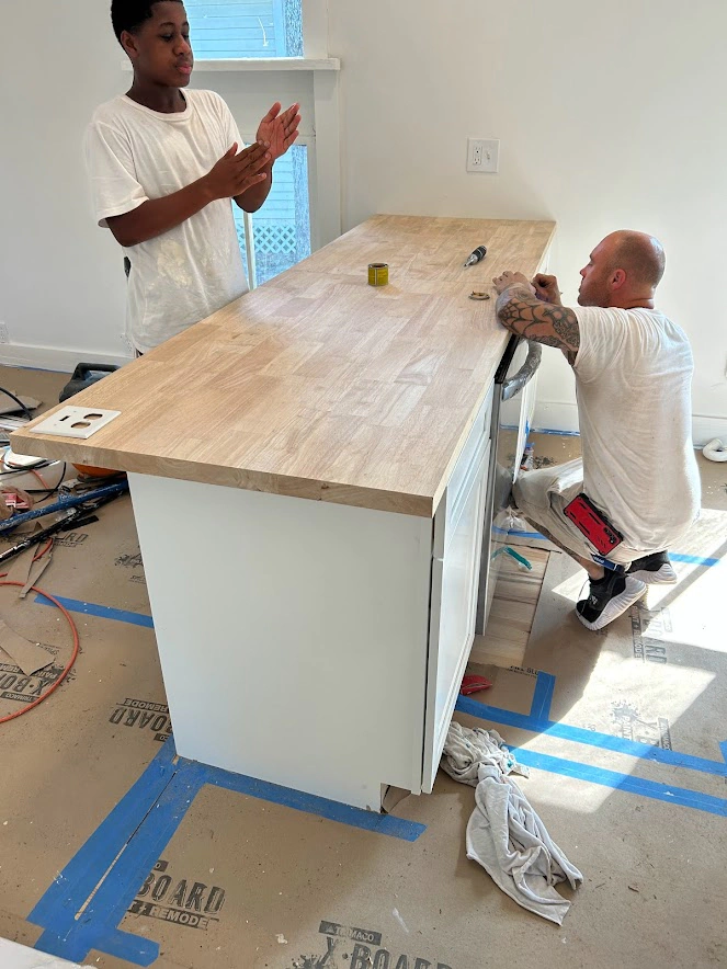 Kitchen Island Install with an apprentice from our summer internship program